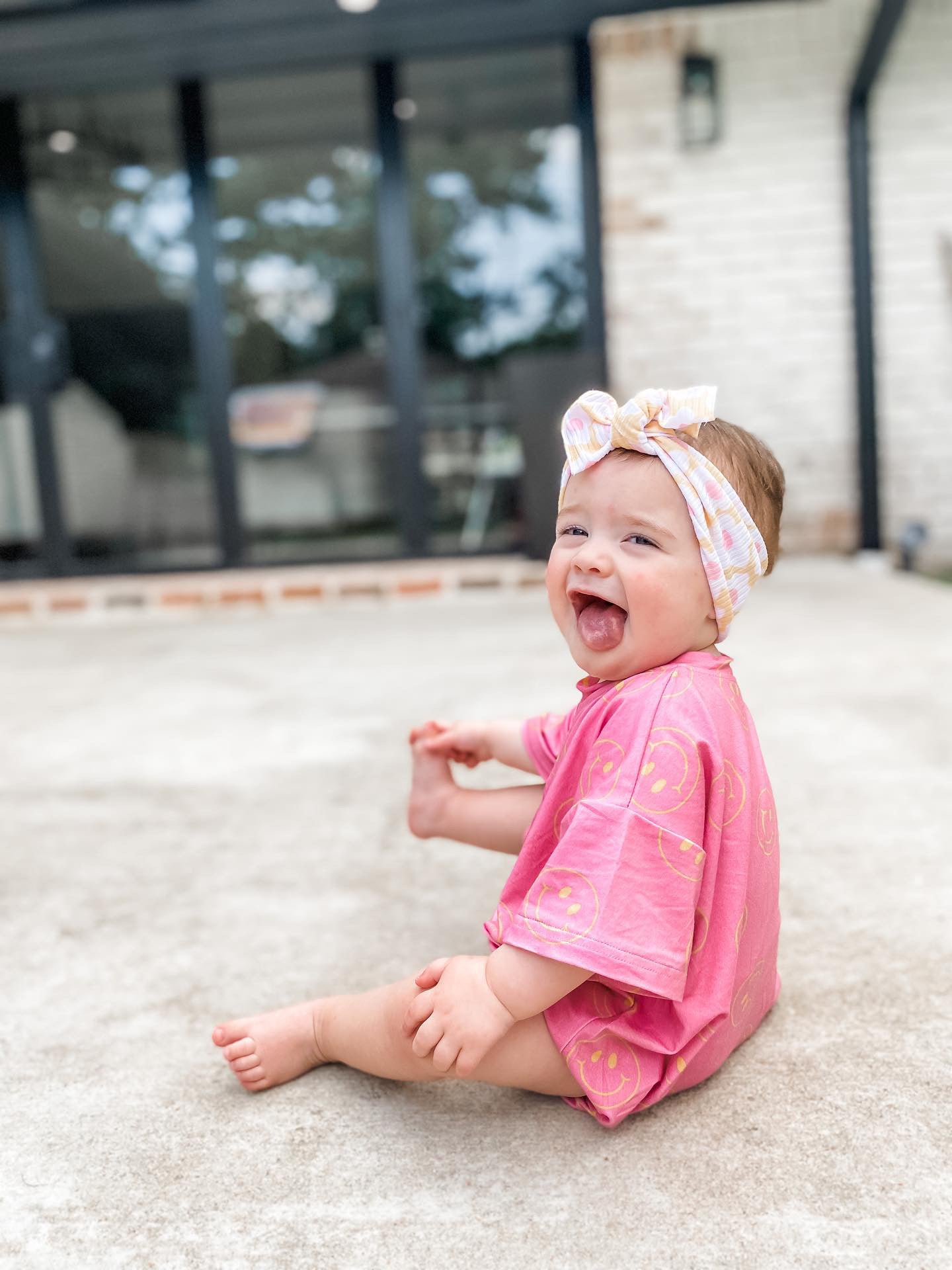 Oversized Pink Smiley Romper