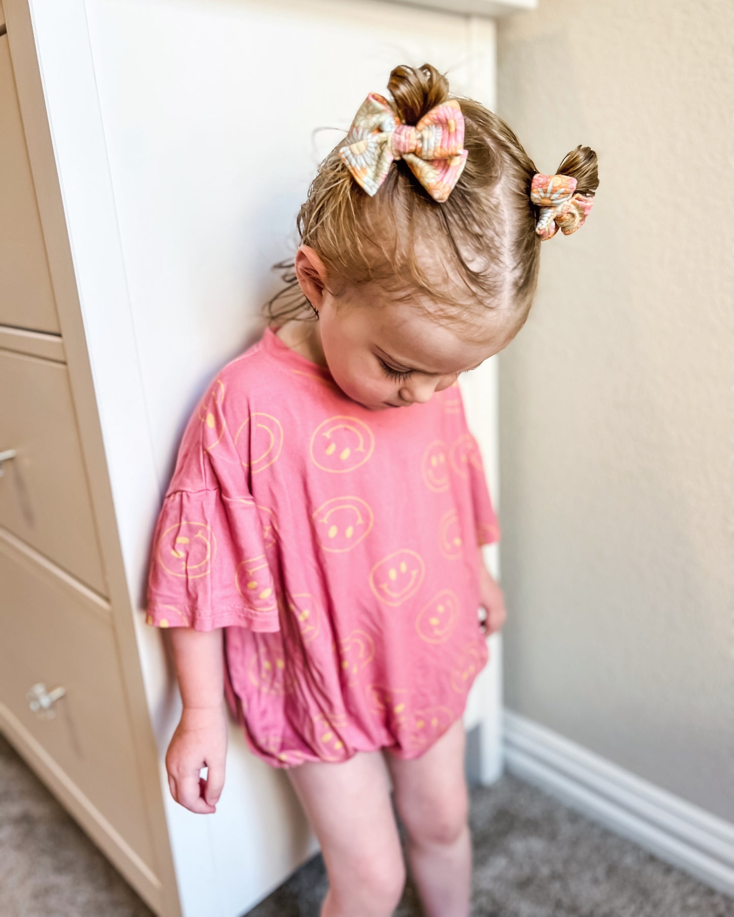 Oversized Pink Smiley Romper